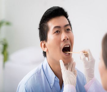 man having a swallowing assessment